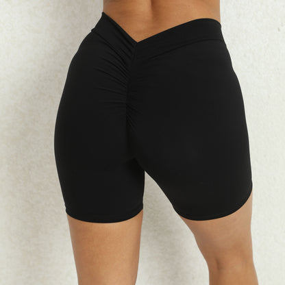 Shorts de yoga moulants en forme de V