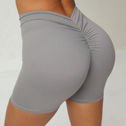 Shorts de yoga moulants en forme de V